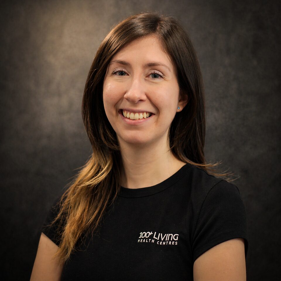 Team member Laura posing for a profile photo